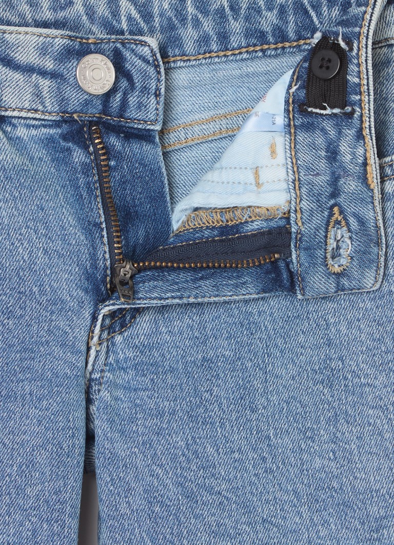 Džíny Calvin Klein s rovnými nohavicemi a klopovými kapsami