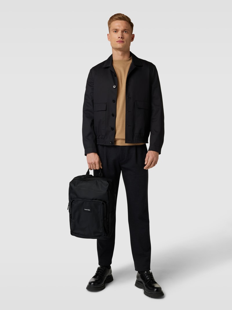 Rucksack mit Label-Patch Modell 'MUST' in schwarz