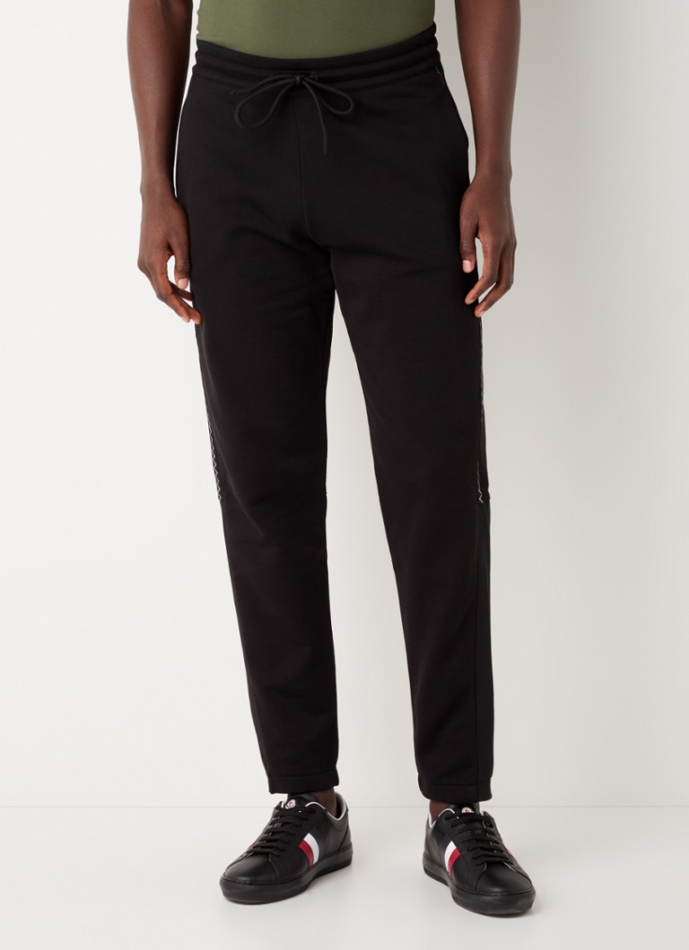 Pantaloni de trening Moncler slim fit cu imprimeu