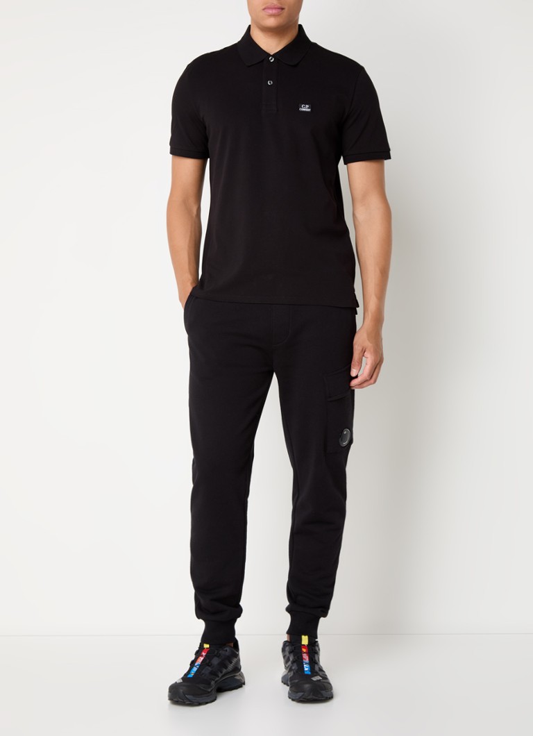 Polo CP Company de corte regular em algodão piqué com logotipo.