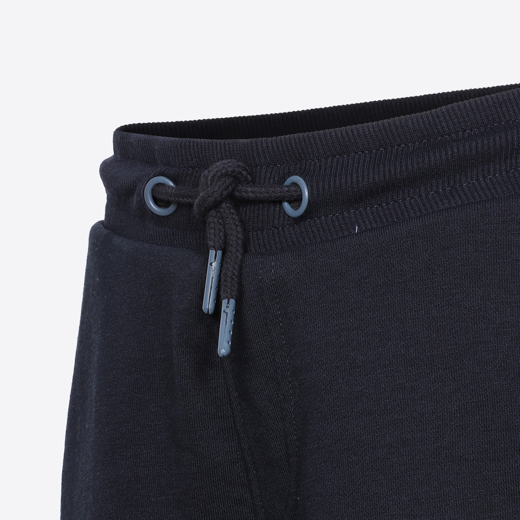 PIMA   Short jogging bleu marine garçon