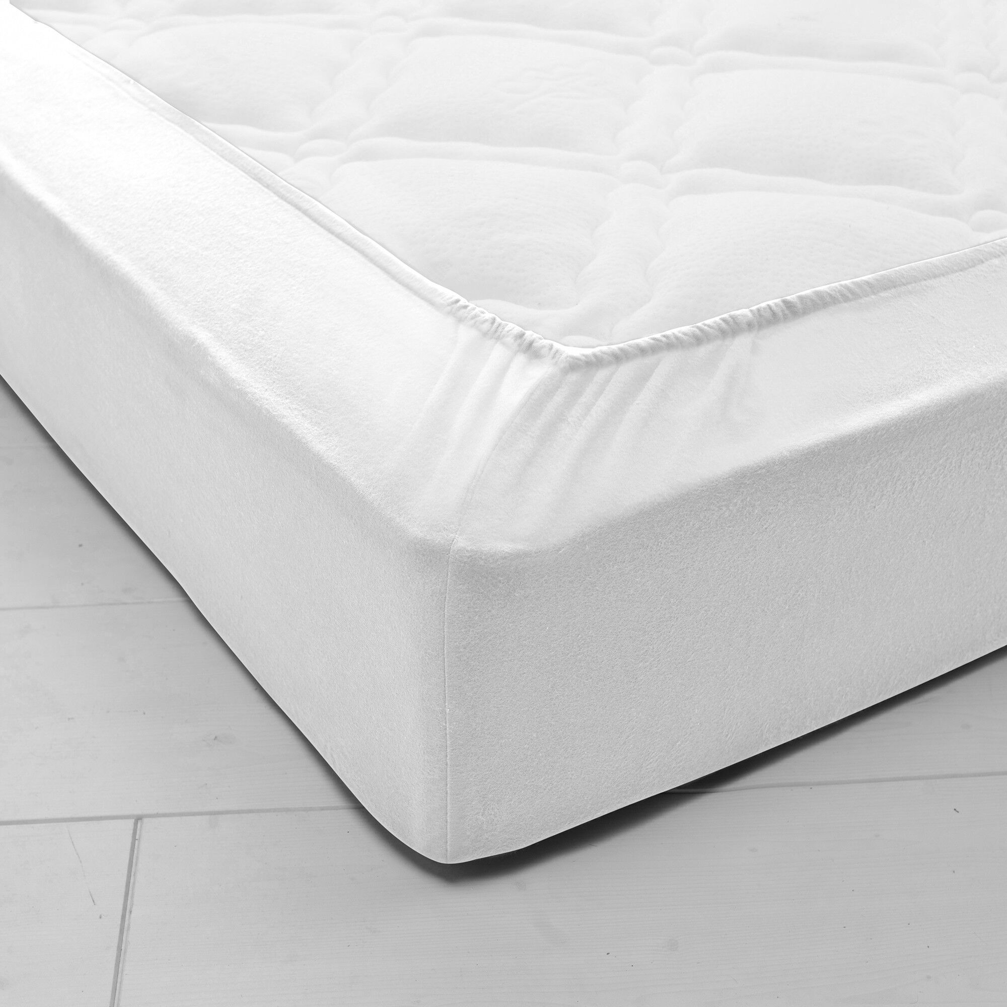 Drap-housse uni flanelle bonnets 32 cm