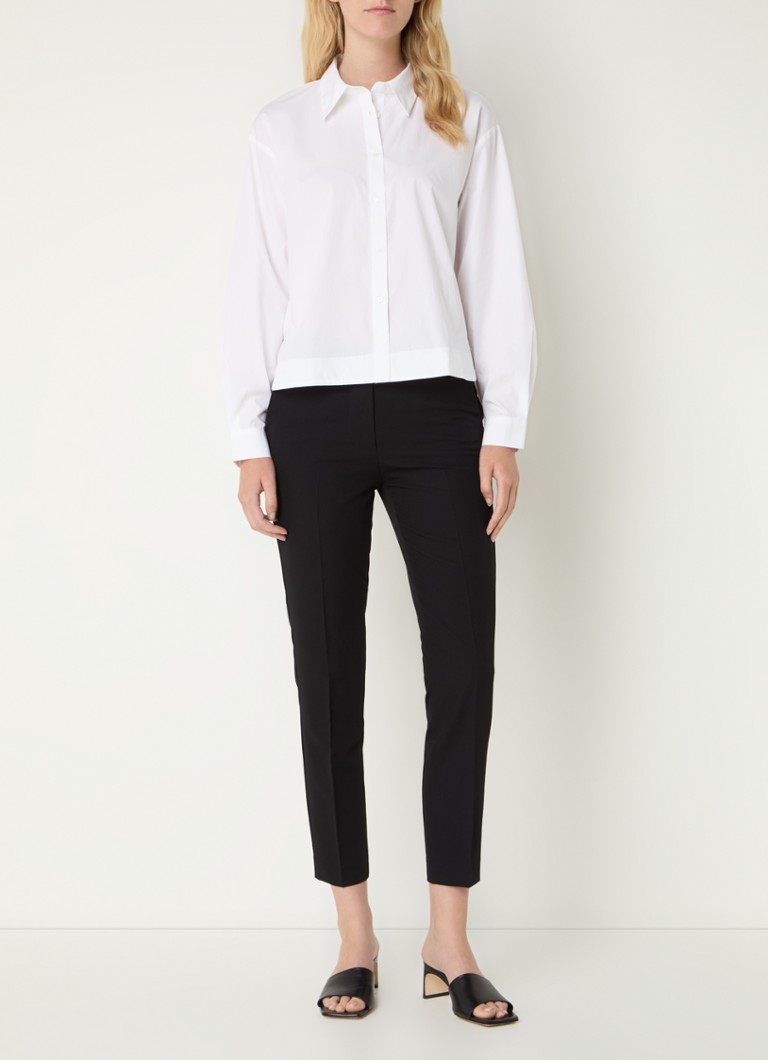 Pantaloni chino Benetton, lungi până la gleznă, cu talie medie, croială mulată și buzunare laterale.