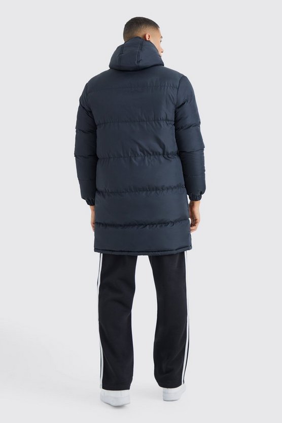 Lange Steppjacke mit Taschen