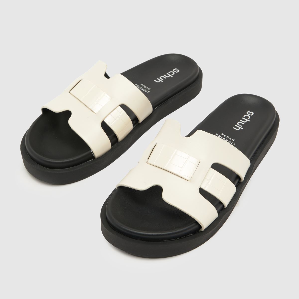 Schuh Timmy Crocs talpbetétes szandál törtfehér színben