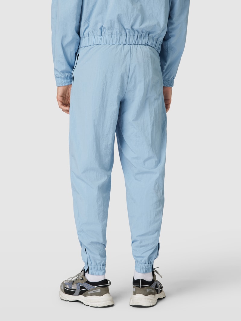 Trainingshose mit Label-Print Modell 'Track Suit' in rauchblau