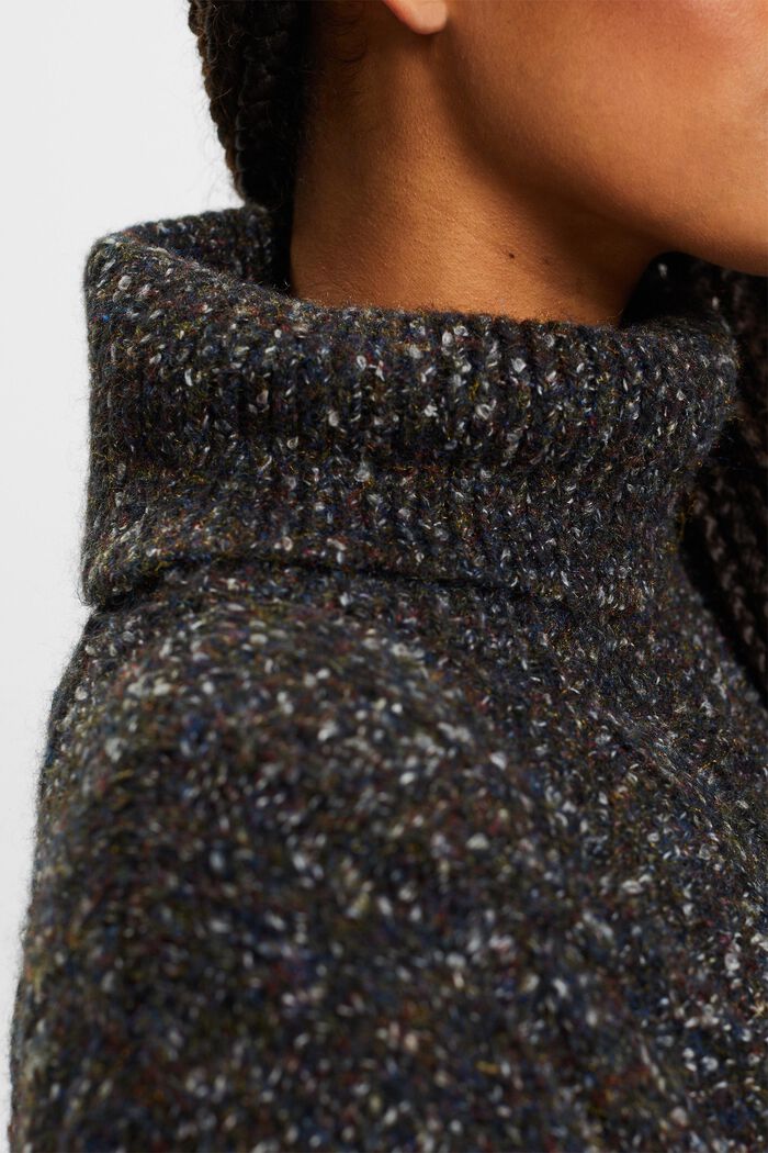Rollkragenpullover im Zopfstrick-Design