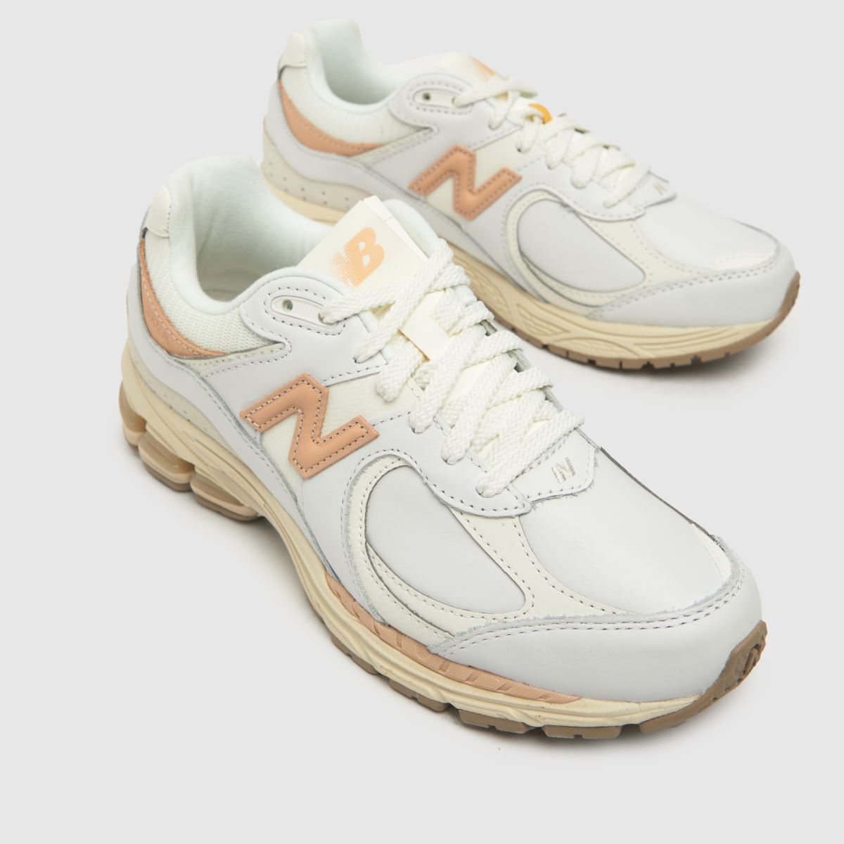New Balance 2002r sportcipő fehér és bézs színben