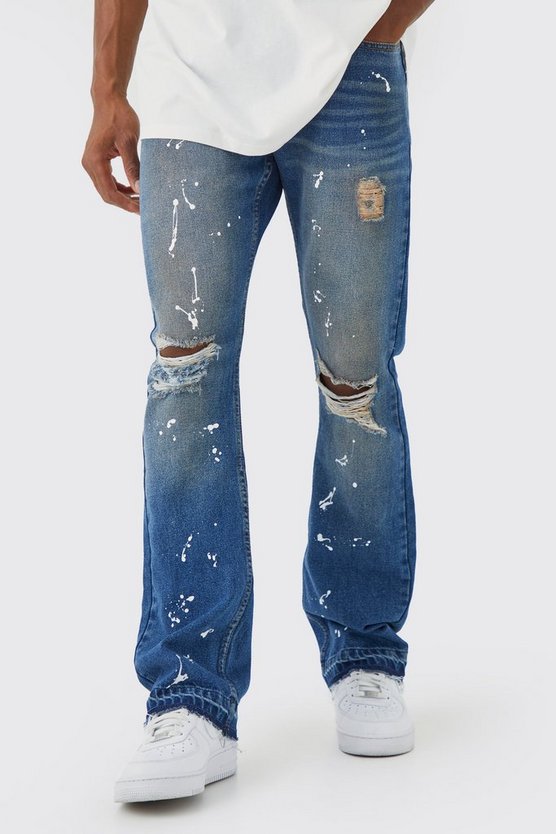 Slim-Fit Schlagjeans mit Riss am Knie