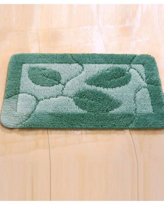 Tapis de bain motif feuilles.