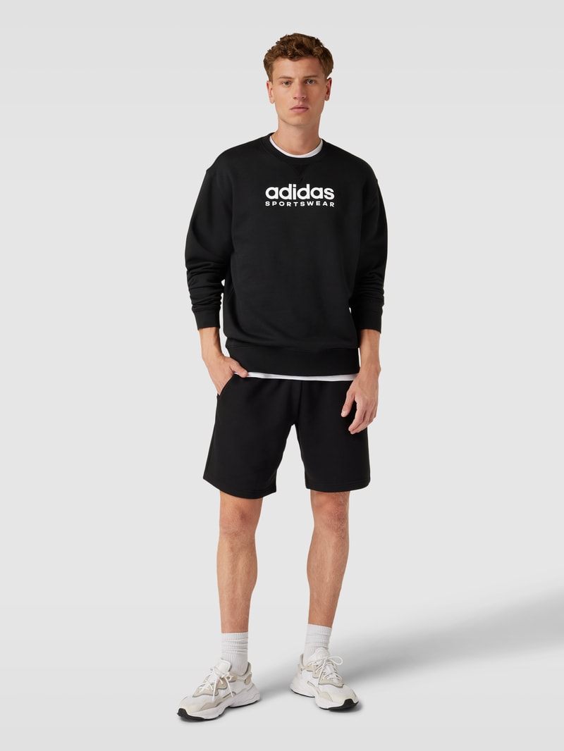 Sweatshirt mit Label-Print in schwarz