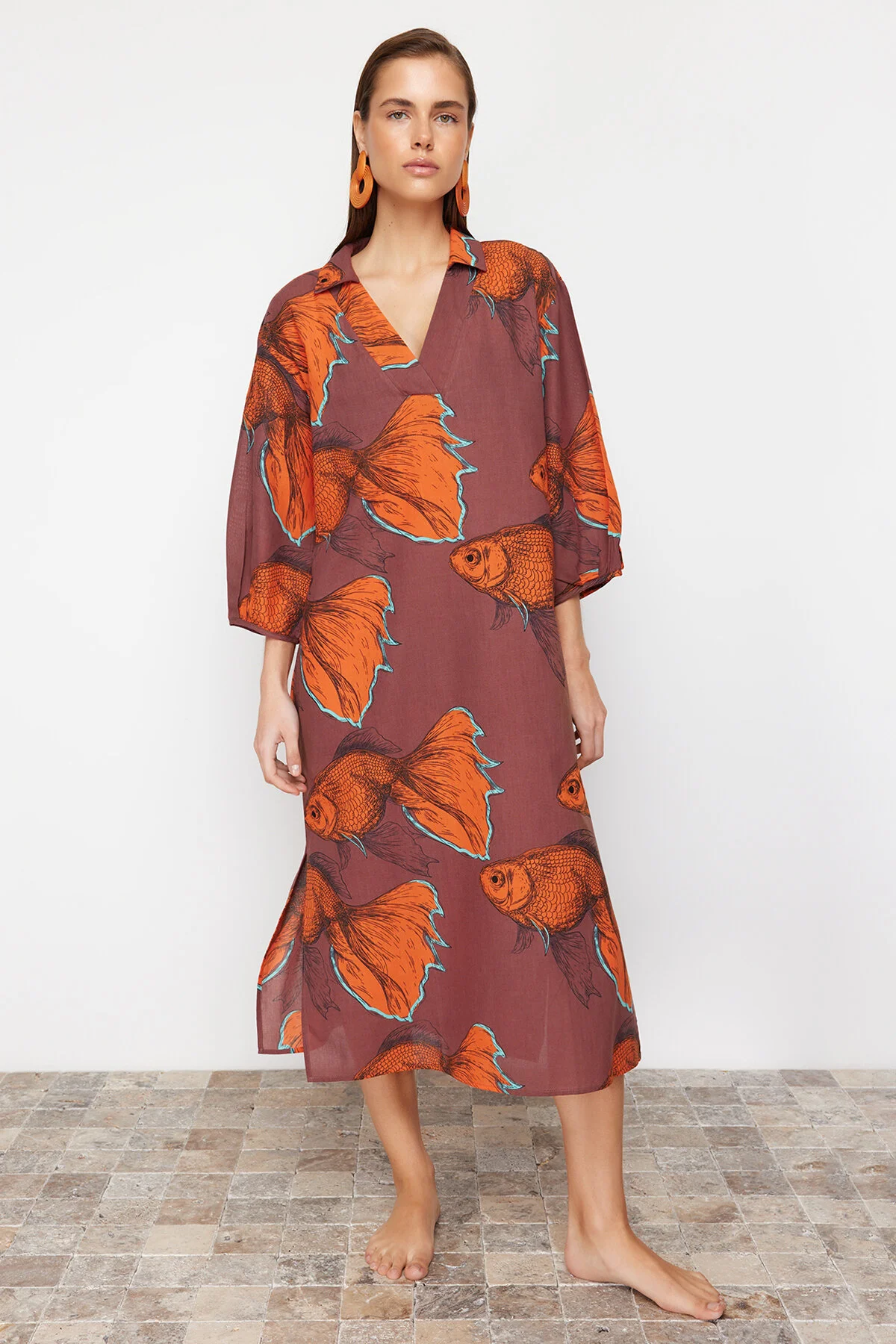 Trendyol Collection  Gewebtes Midi-Strandkleid mit weiter Passform und Animalprint TBESS22EL0009