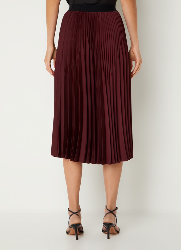 Fustă midi plisată Bahia de la Gerard Darel, confecționată din material elastic.