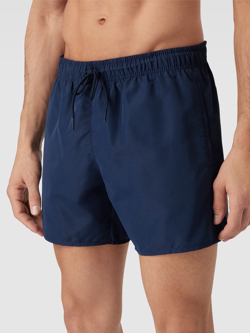 Badehose mit Label-Patch in dunkelblau
