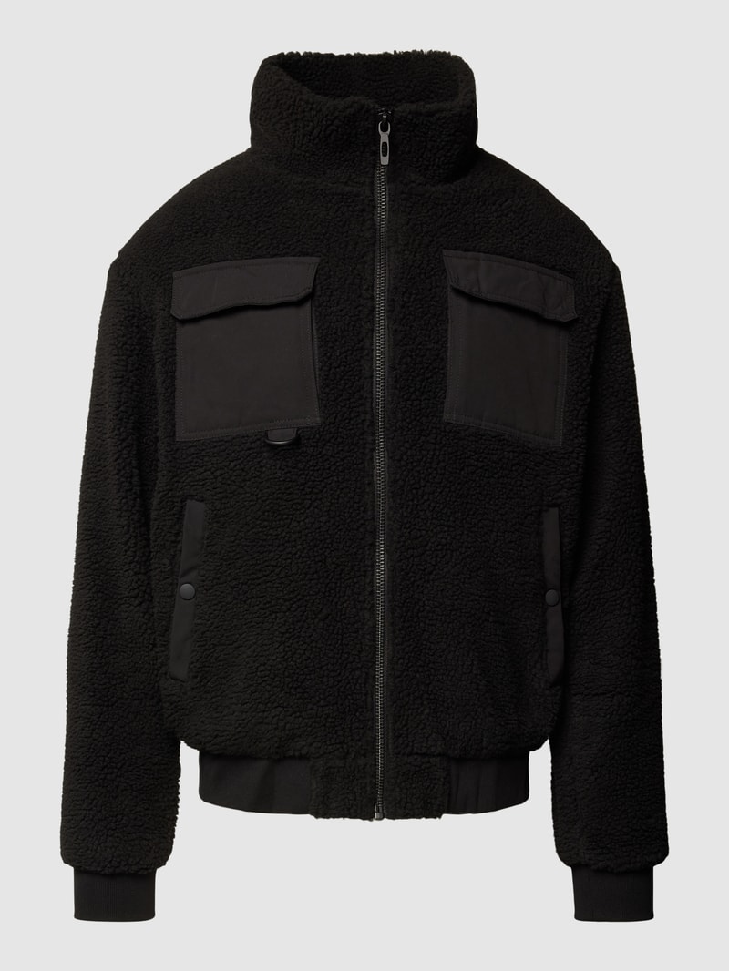 Jacke mit Stehkragen und Brusttaschen in schwarz