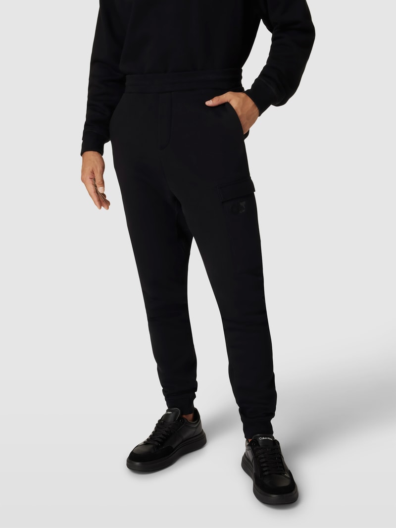 Sweatpants mit Cargotasche Modell 'PEOVA' in schwarz