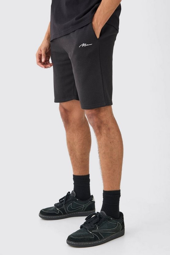 Man Signature Loose Fit Mid Length Shorts