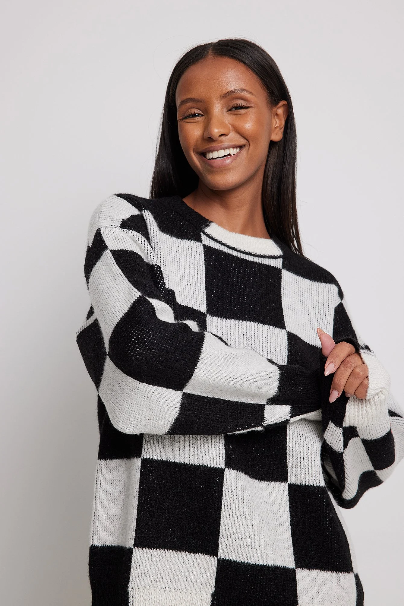 Karierter Strickpullover mit Kragen