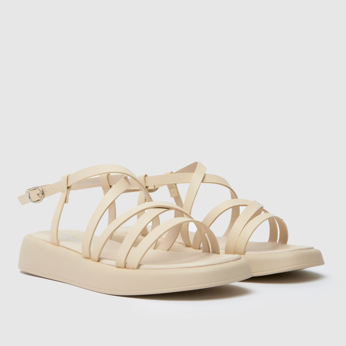 Schuh Wide Fit tristan pántos szandál törtfehér színben