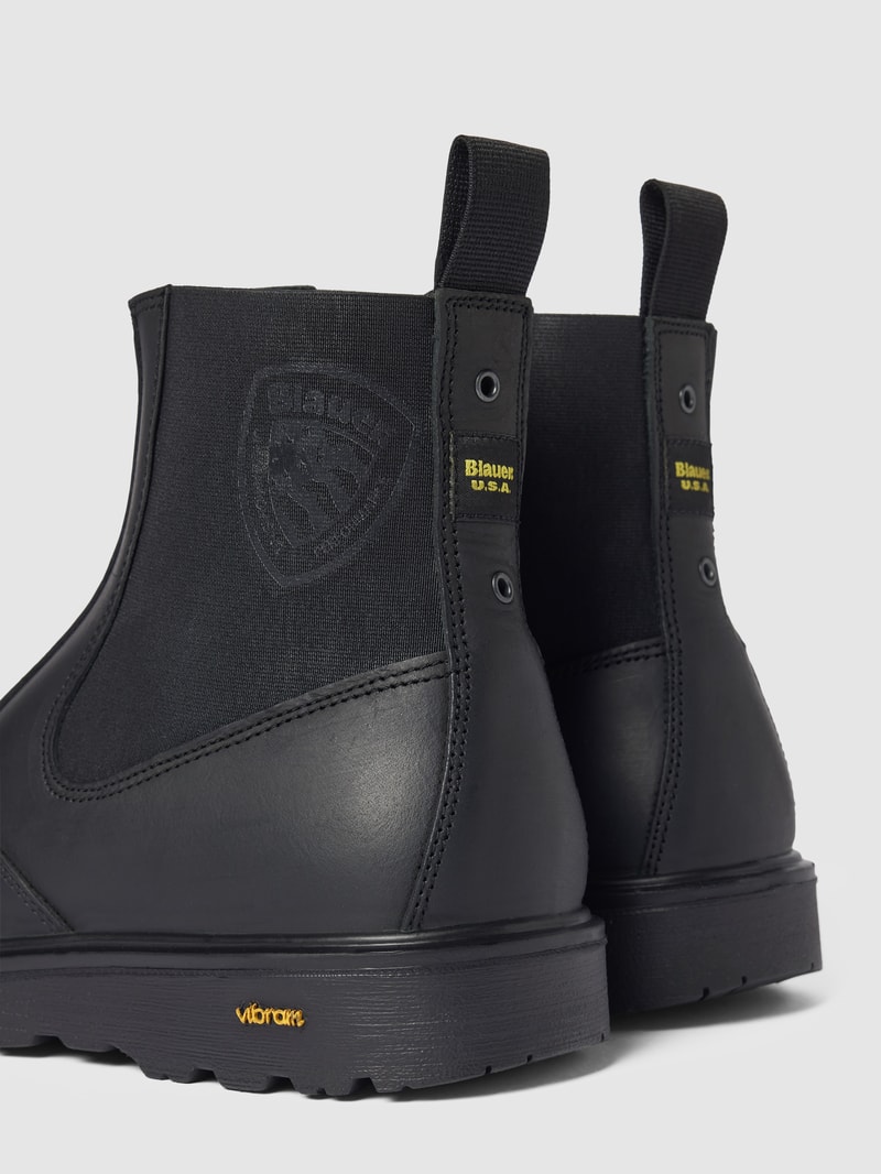 Ankle-Boots mit Label-Print in schwarz