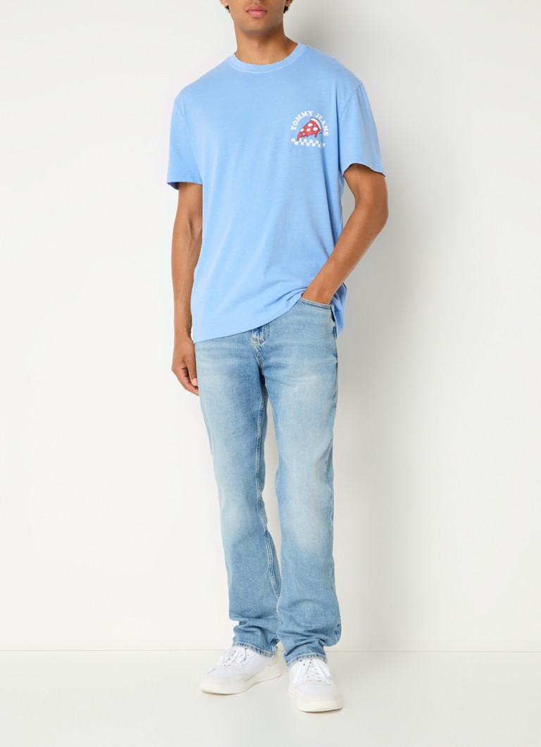Tricou Tommy Hilfiger din bumbac organic, cu logo și imprimeu pe spate.