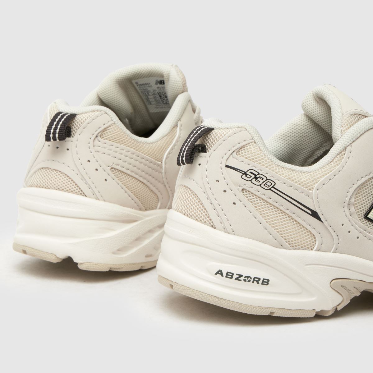 New Balance 530 Junior träningsskor i benvitt