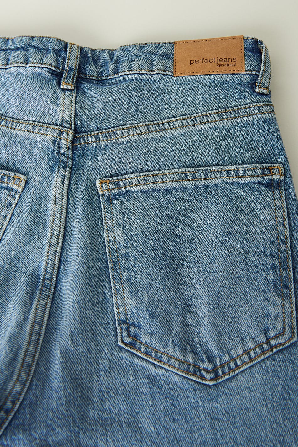 High waist tall slit jeans