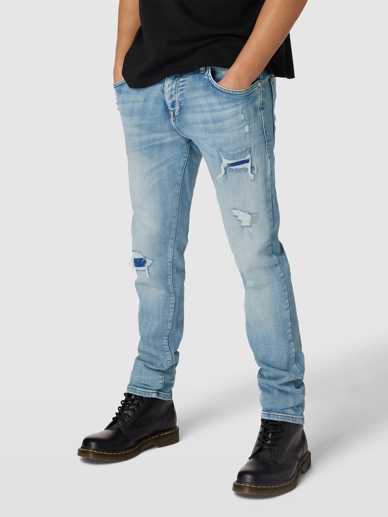 Tapered Fit Jeans mit Destroyed-Details Modell 'Joshua' in hellblau
