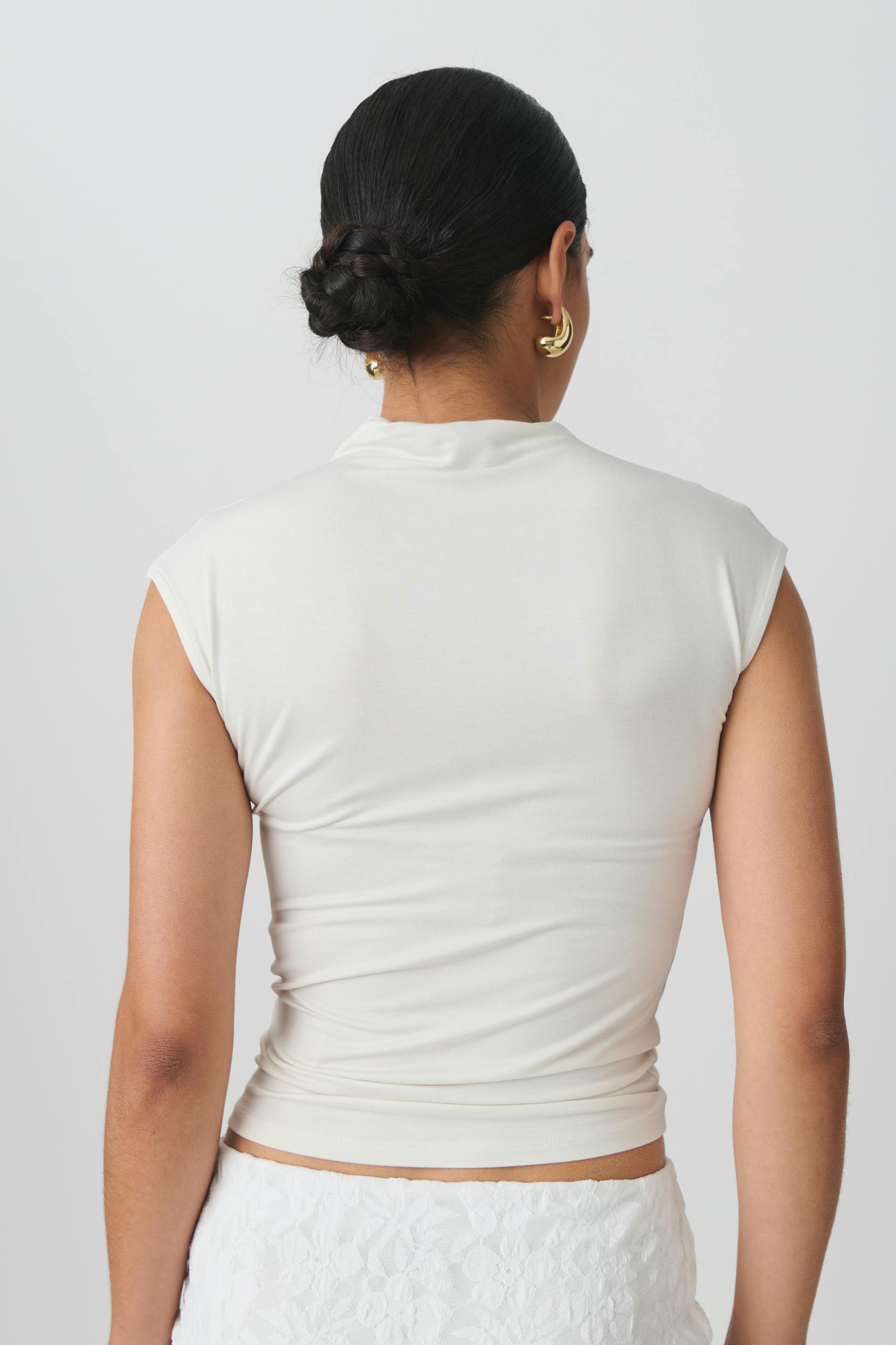 Soft touch funnel neck top