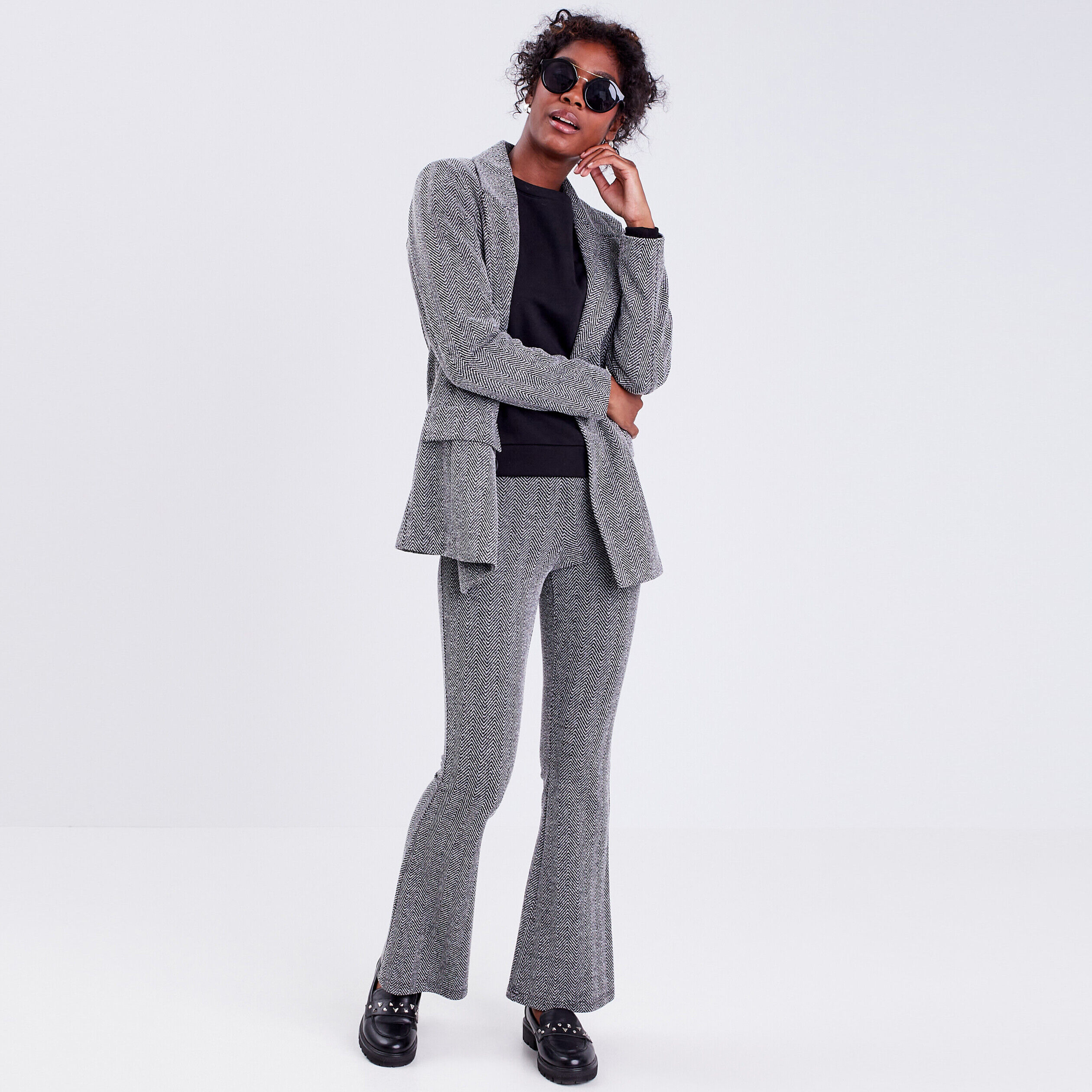 Pantalon yoga bootcut noir femme | Cache Cache