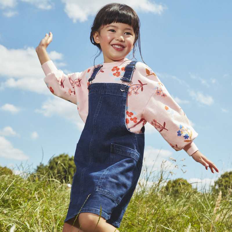 Robe-salopette fille en jean bleue Catimini