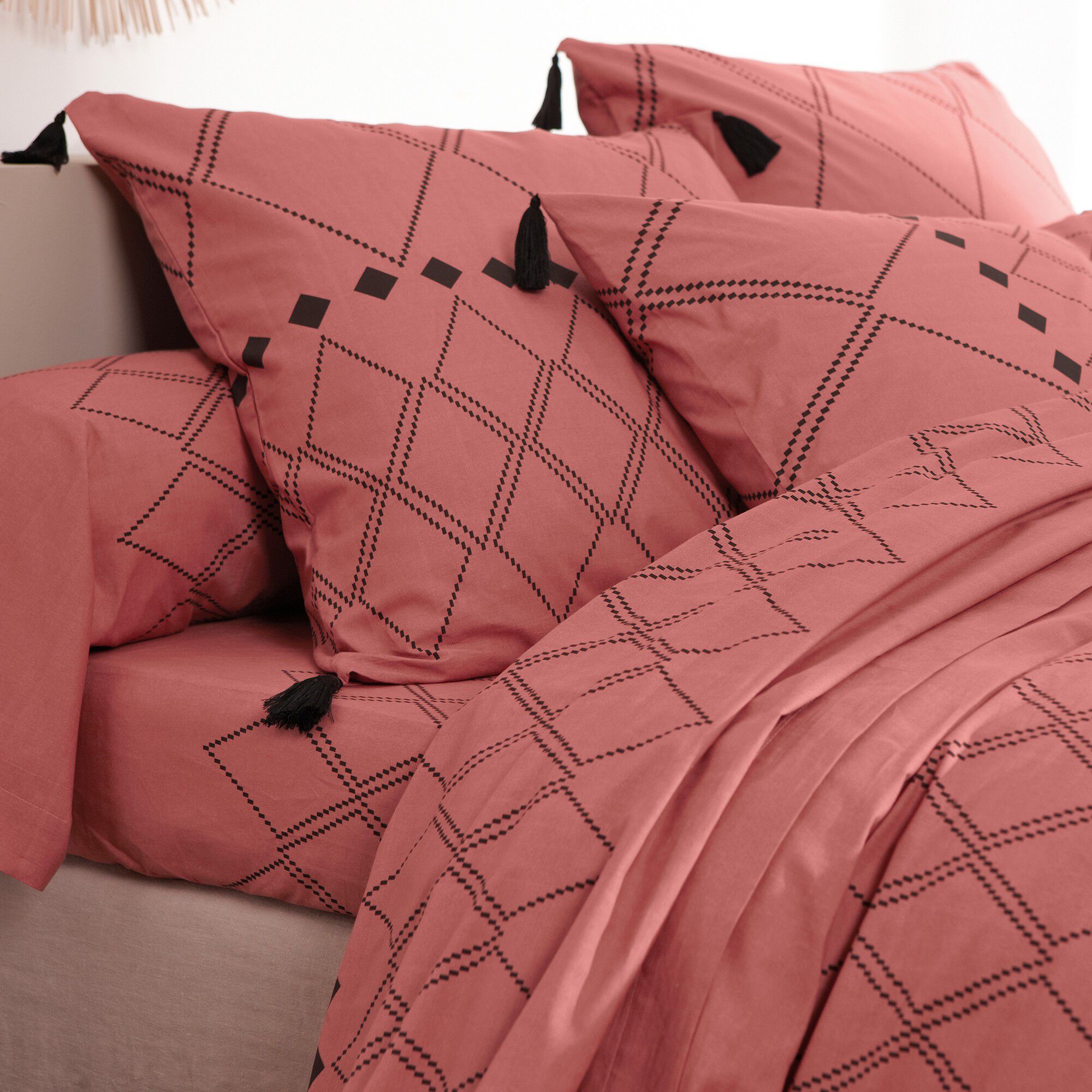 Linge de lit Massaï coton à motifs graphiques et finitions pompons