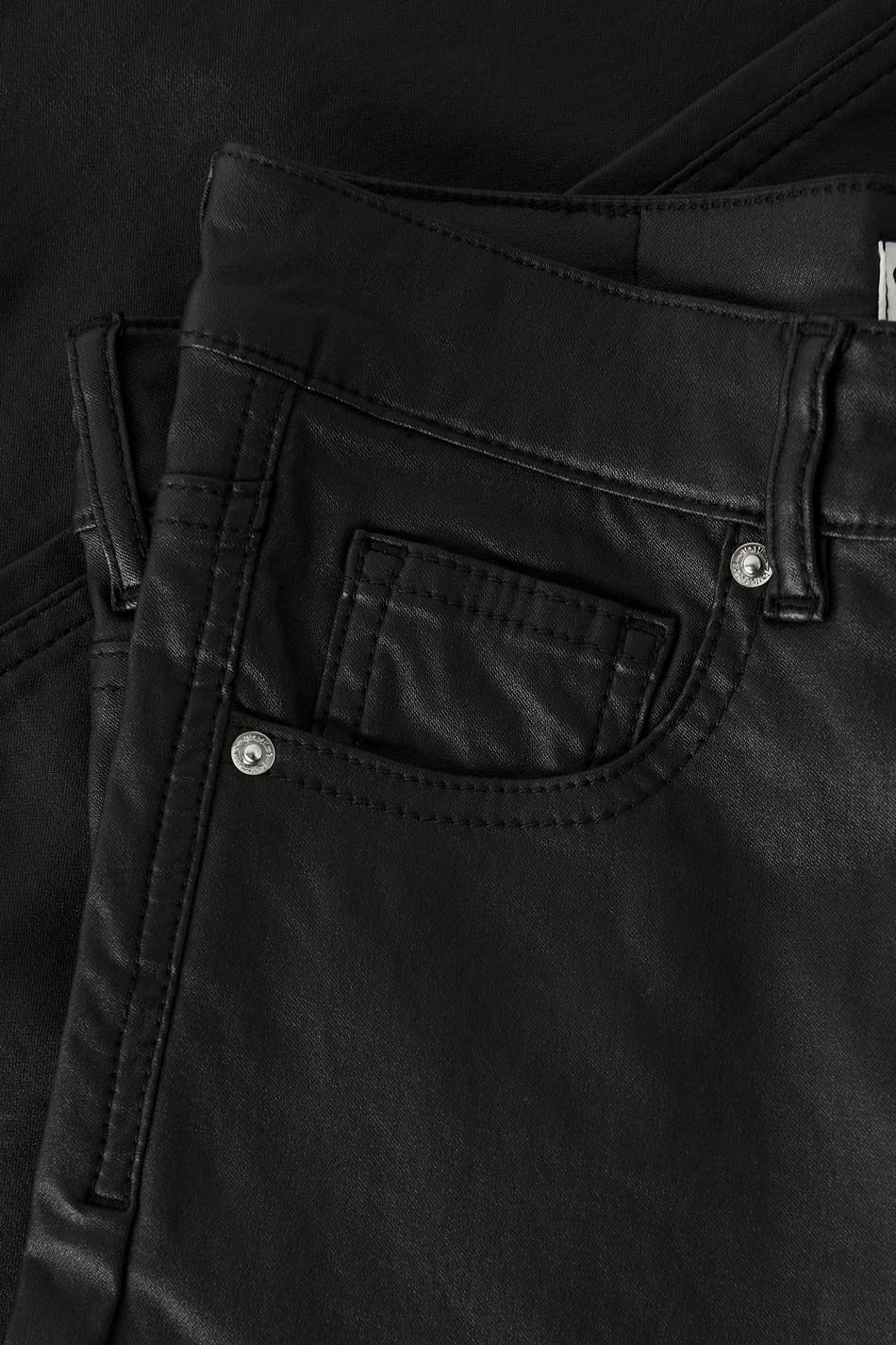 Coated slit jeans