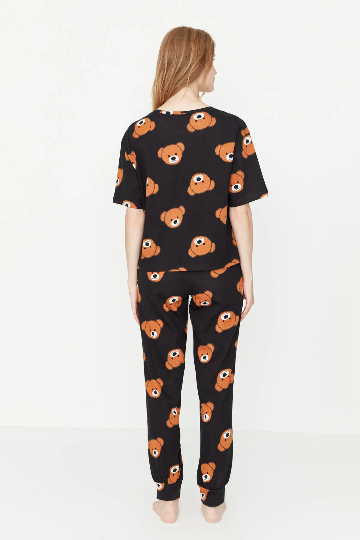 Trendyol Collection  Schwarzes Strick-Pyjama-Set aus 100 % Baumwolle mit Teddybär-Muster, T-Shirt und Hose THMSS21PT0195