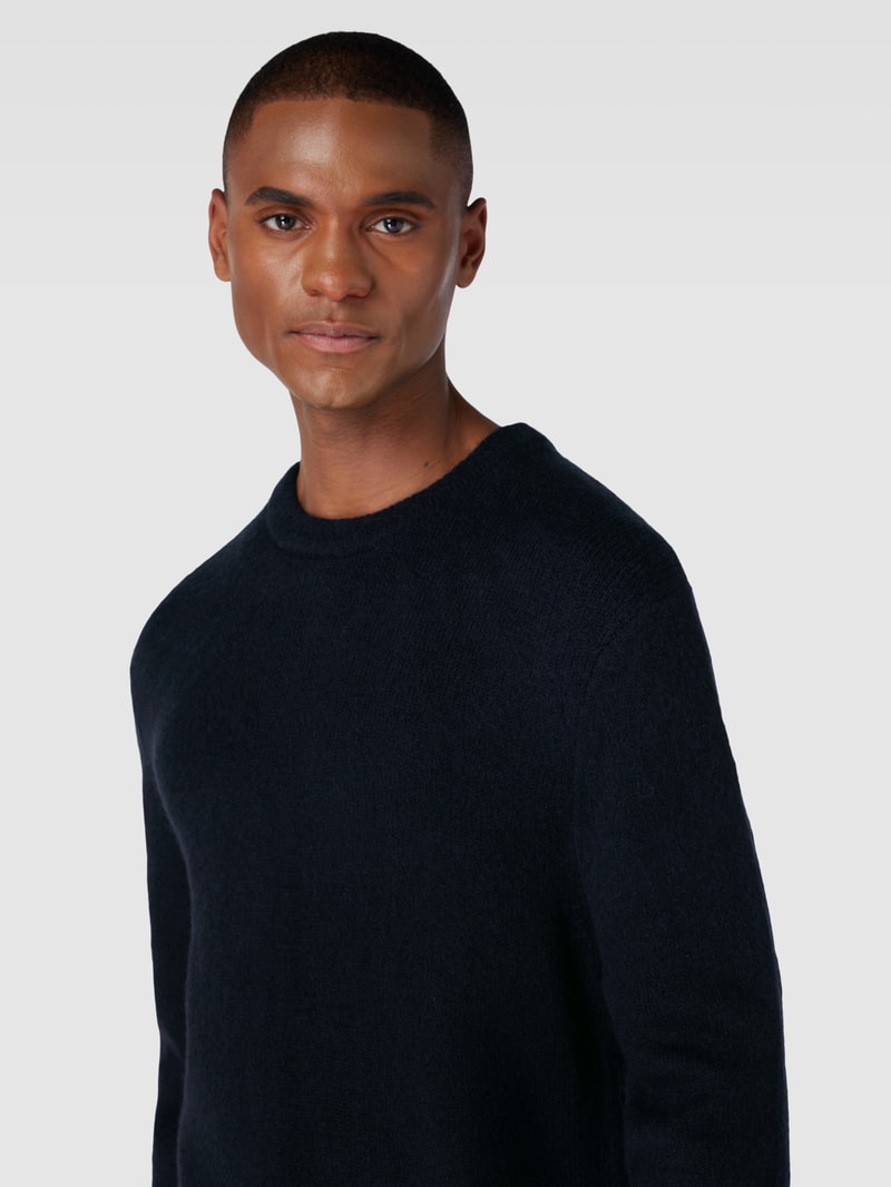 Strickpullover in melierter Optik in marineblau