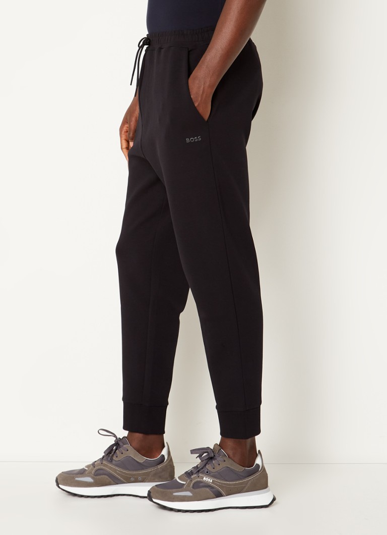 Calça de jogging HUGO BOSS Hadiko com corte afunilado e bolsos com costura.