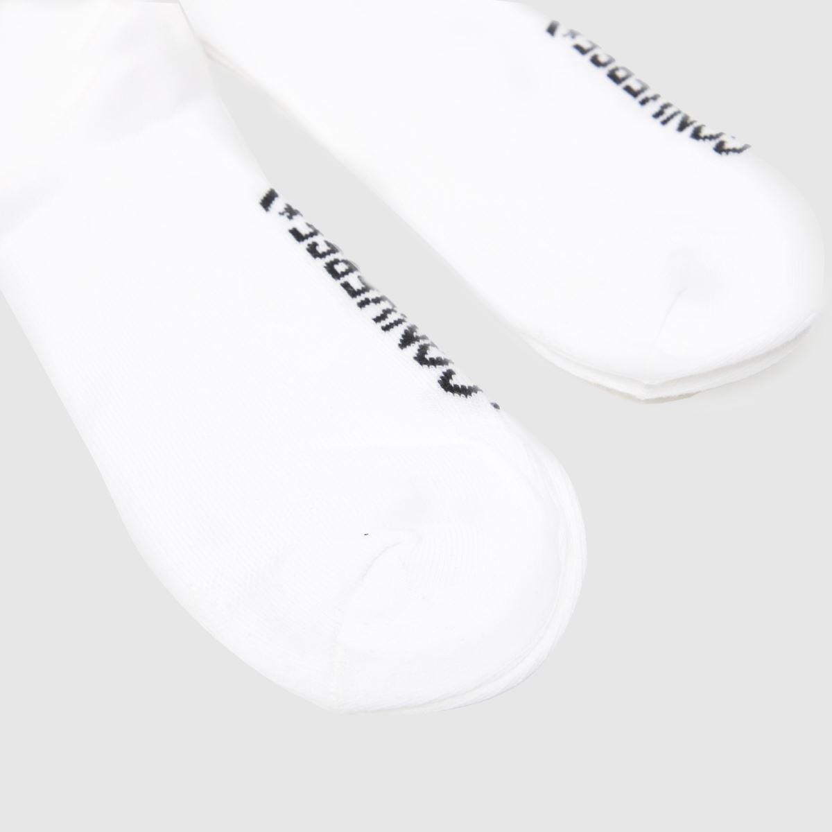 Komplet dveh belih in črnih nogavic Converse z zvezdastim chevron vzorcem