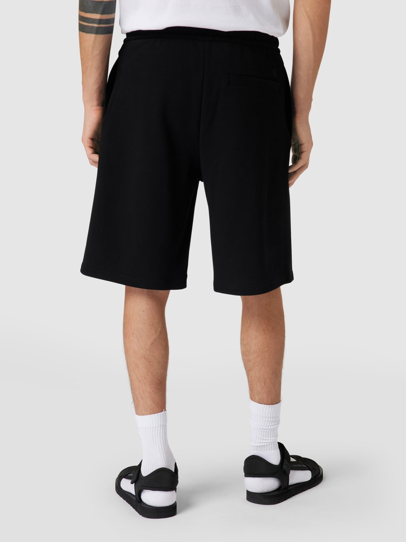 Sweatshorts mit Label-Print in schwarz