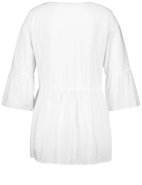 Ausgestellte Bluse mit Volants