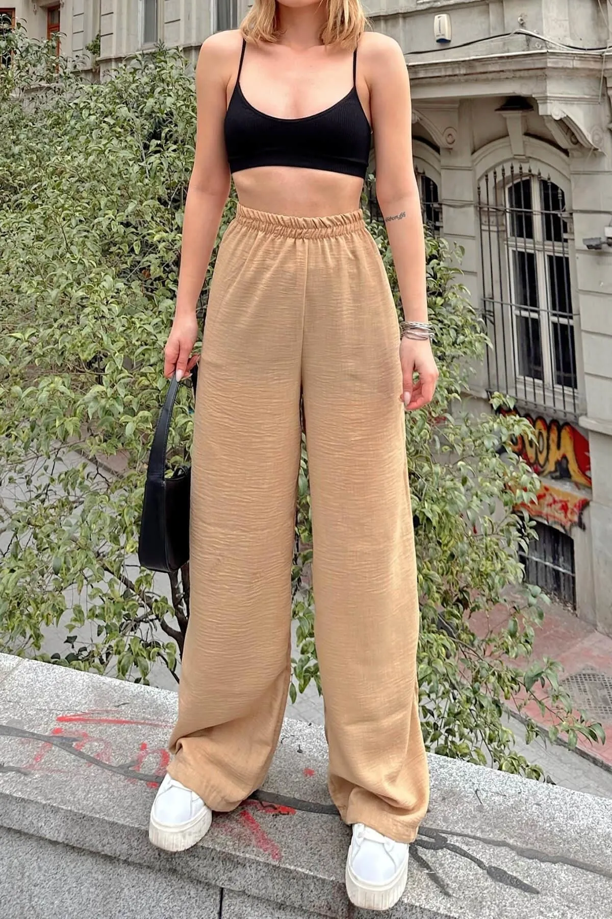 Swist  Mink Lure Ayrobin-Jogginghose für Damen mit hoher Taille und geschlitzten Beinen