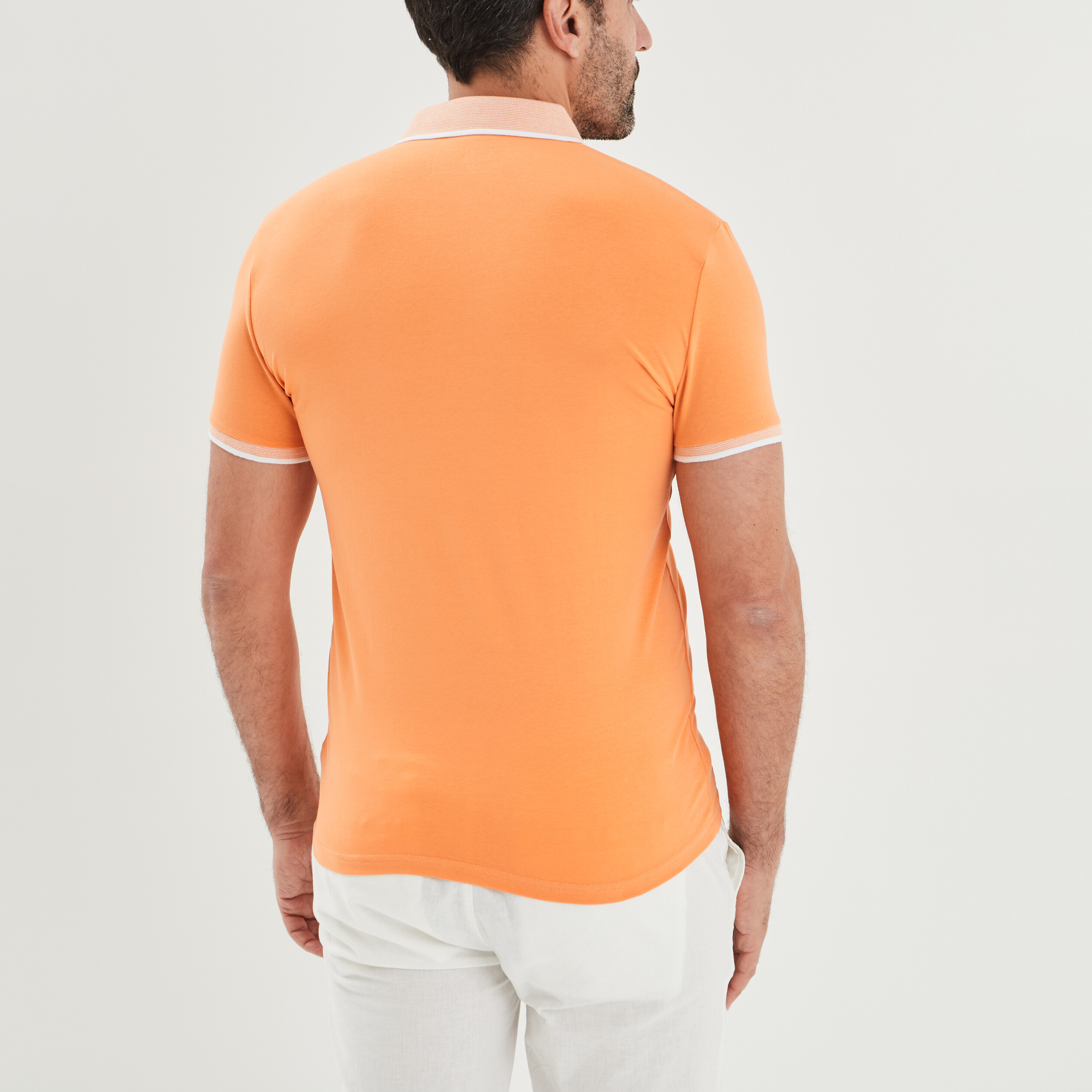 Polo ajusté manches courtes orange clair homme | La Halle