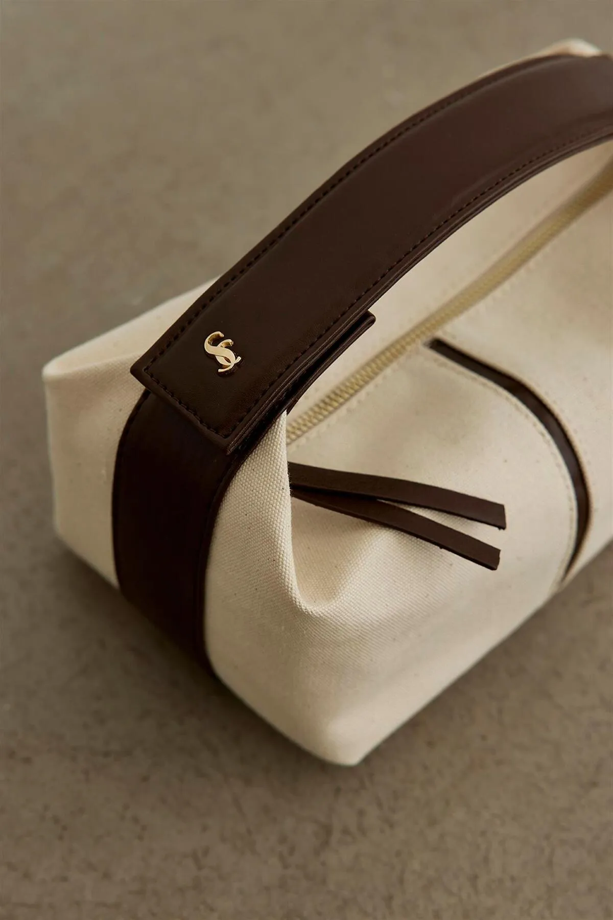 Suud Collection  Bitterbraune Archi Mini-Tasche