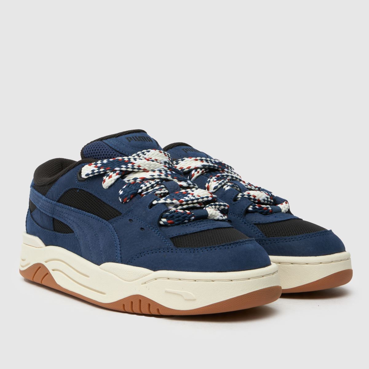 PUMA – 180 marinblå träningsskor med spetsmotiv