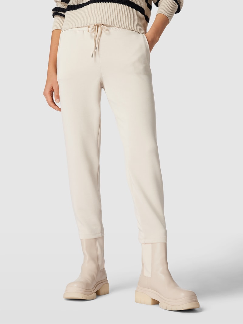 Sweatpants mit Paspeltaschen am Gesäß in ecru