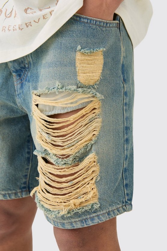 Lockere zerrissene Jeansshorts in Antik-Waschung