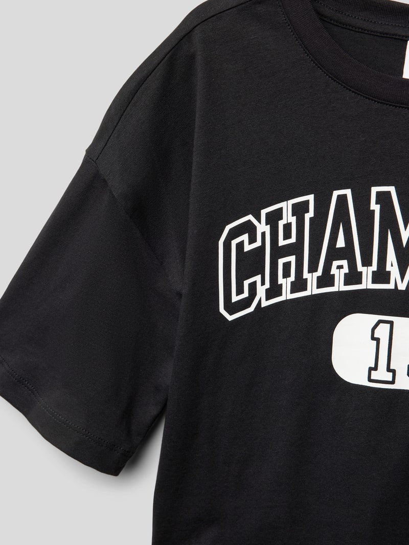 Cropped T-Shirt mit Label-Print in schwarz