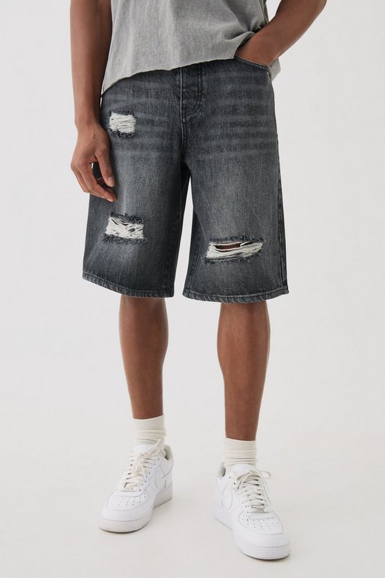 Schwarze Jeansshorts mit Riss am Knie