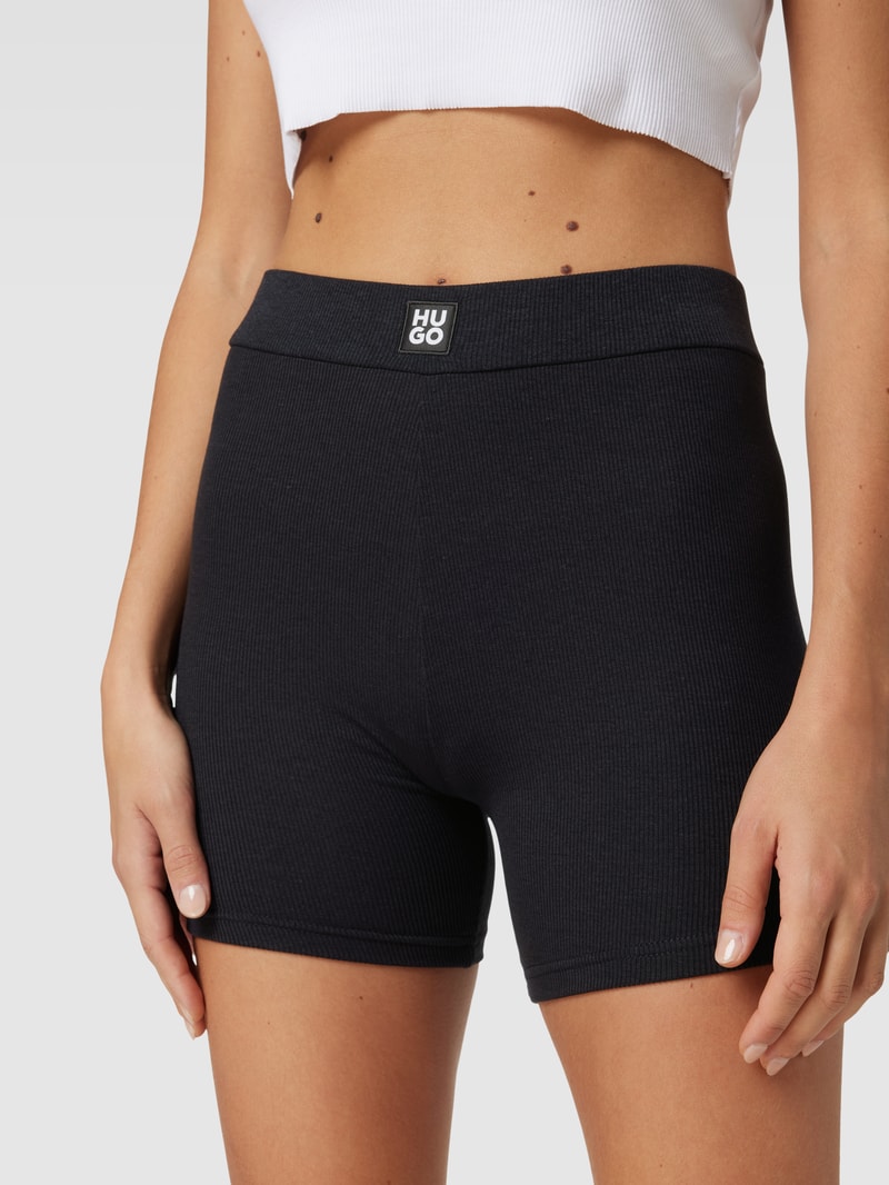 Shorts mit Label-Patch Modell 'NAIANI' in schwarz