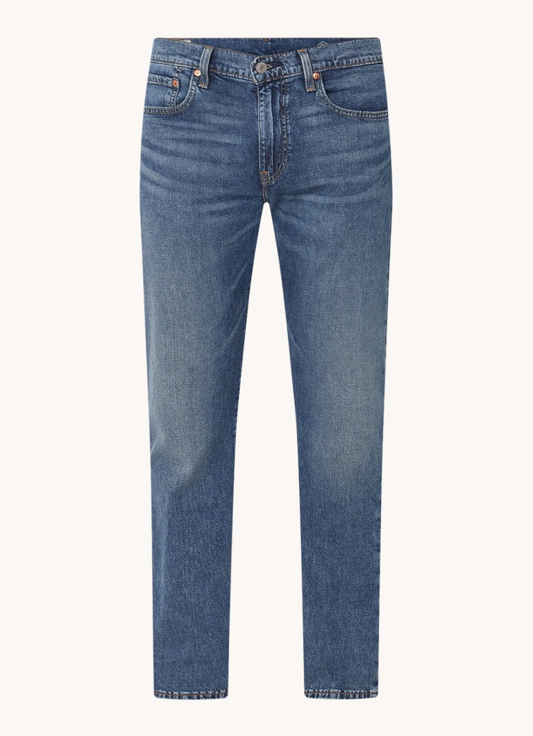 Pantaloni conici Levi's Vaqueros, confecționați din material lyocell, spălare medie.
