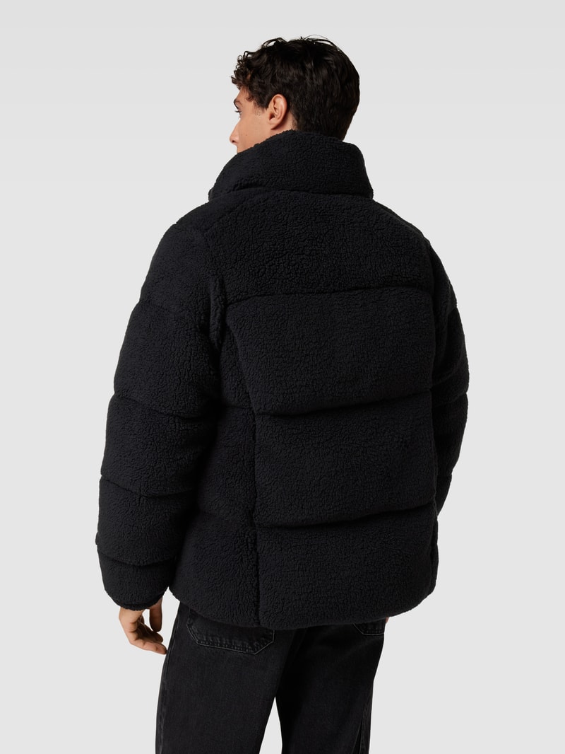 Steppjacke aus Teddyfell in schwarz